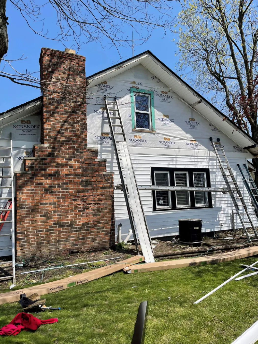 Siding installation documented in Olive Branch Manor
